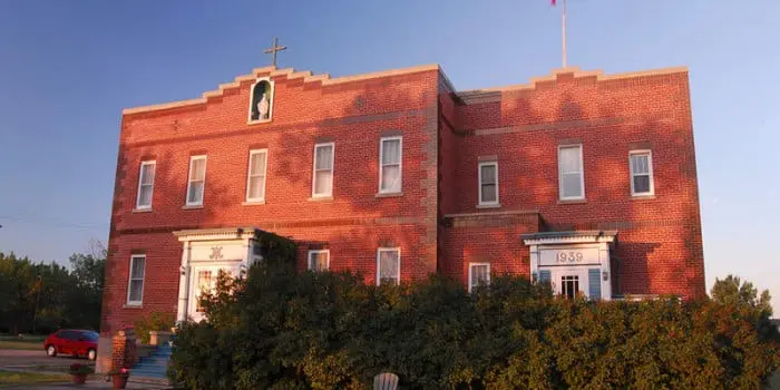 Front view of the Convent Inn, location of art workshops offered by experienced artist and teacher Laureen Marchand in Val Marie SASK