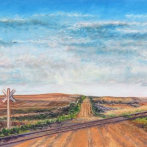 <i>The Crossing</i> Oil painting of a lonely road crossing a railway line with a distant blue sky over a golden coloured landscape by Saskatchewan artist Laureen Marchand